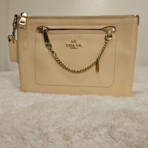 Coach Polished Leather Clutch In Light Blush/ Cream.